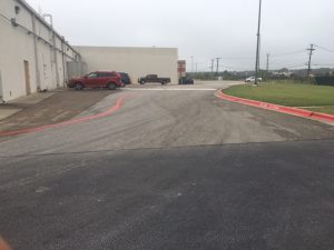 Parking lot with red and white painted lines